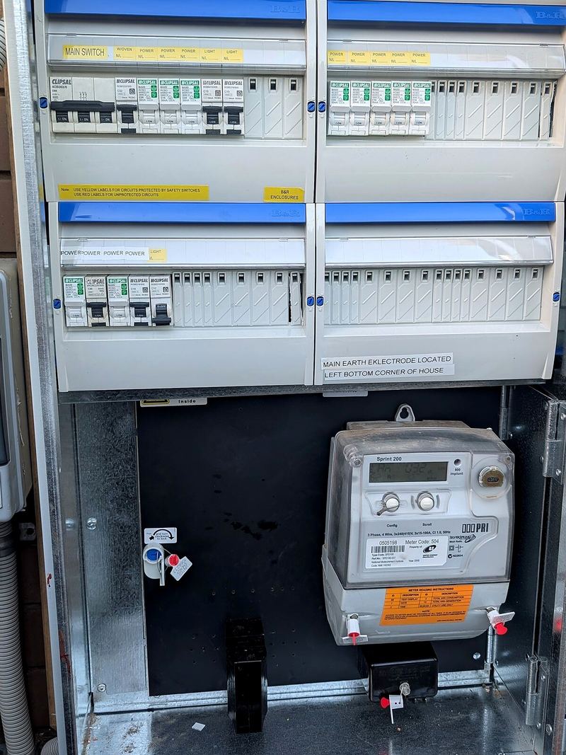 Finished switchboard with labelled circuits and the meter in place