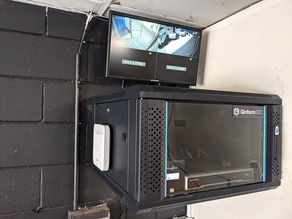 CCTV recorder cabinet with labelled camera cables