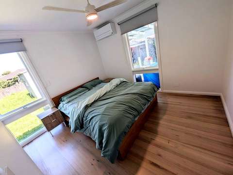 Ceiling fan and downlights fitted in a Seaford home