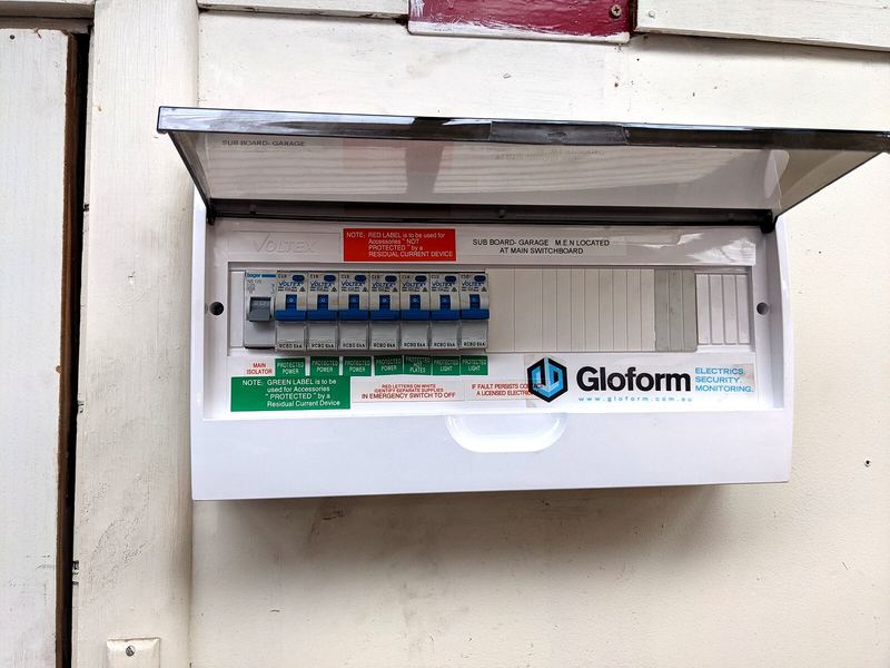 Garage sub-board open with labelled circuits